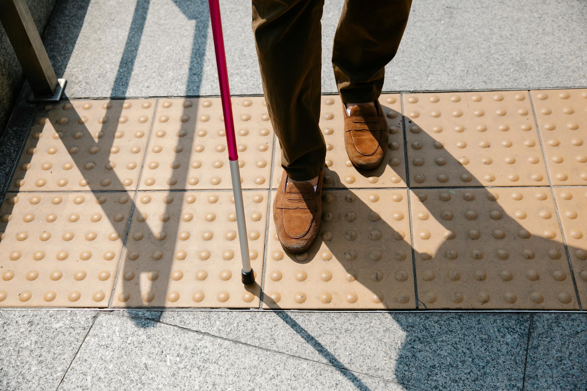 photo of person wearing brown shoes